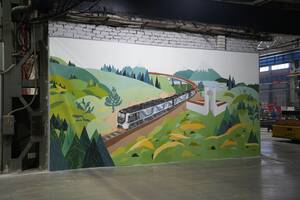 Студенты украсили цех БМЗ огромным граффити локомотива